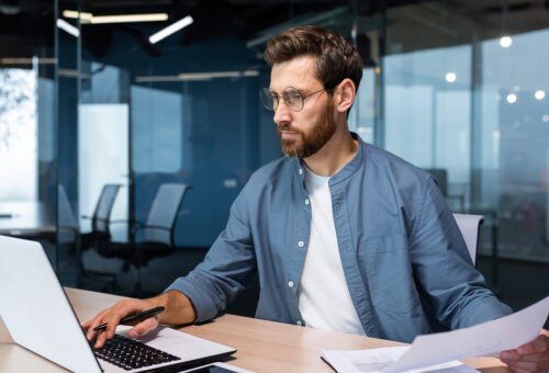 A man, working in compliance for baltic assist clients.
