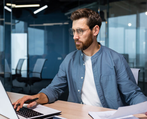 A man, working in compliance for baltic assist clients.